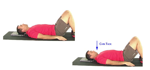 Man lying on yoga mat wearing shorts and red t shirt